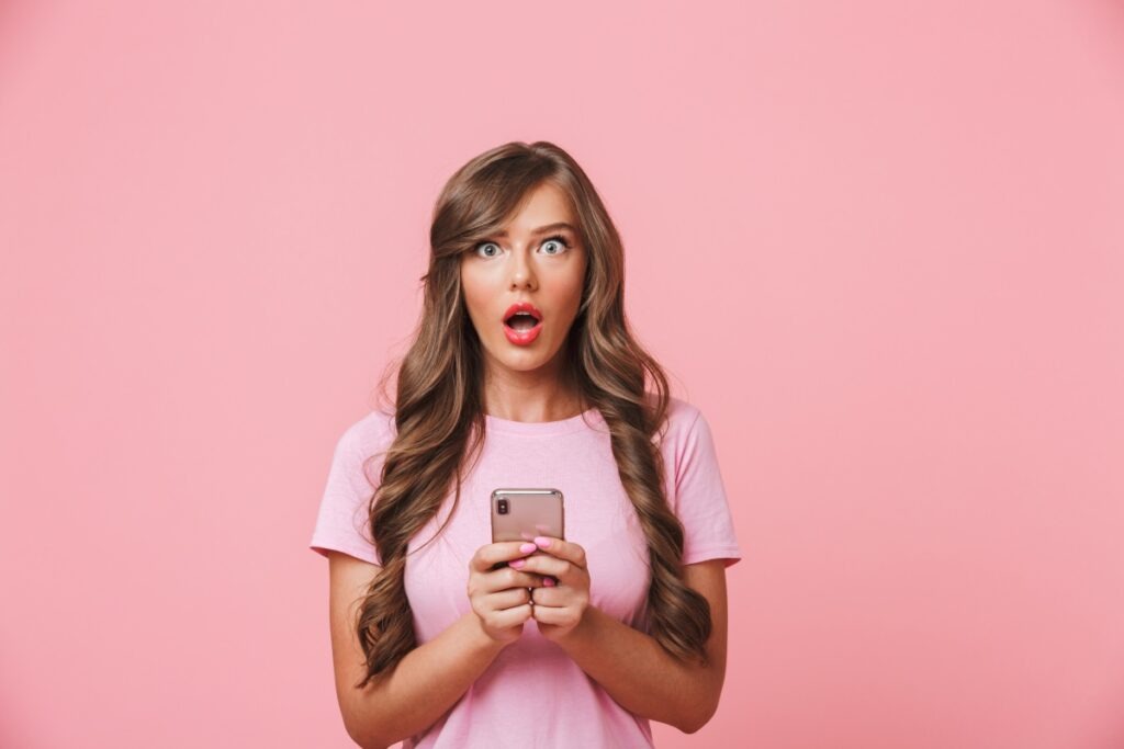 image of surprised brunette woman having B6YDLUR